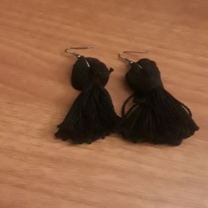 Black pom pom earrings